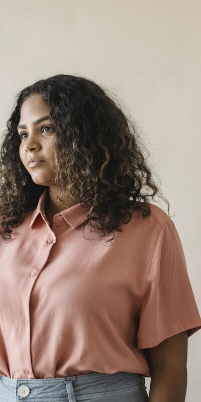 A diverse group of women standing proudly in stylish casual shirts, showcasing modern fashion.